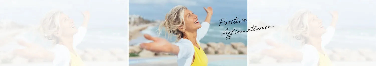 Frau mit ausgebreiteten Armen am Meer, lacht, symbolisiert positive Affirmationen und Freiheit.